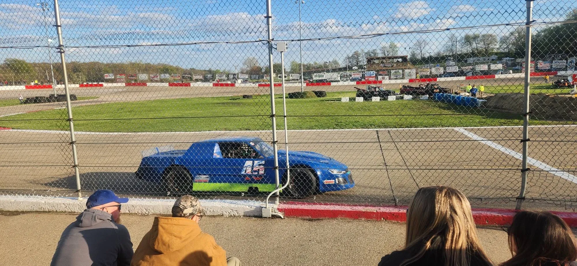 Fans at the fence as the #45 rolls by at Jefferson